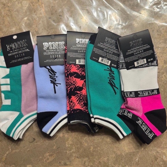 New Pink Victoria’s Secret Socks
With tags 
New Pink socks 
5 pairs included - Picture 3 of 3